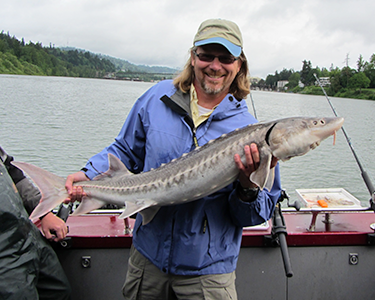 Craig Davis holding a fish. 