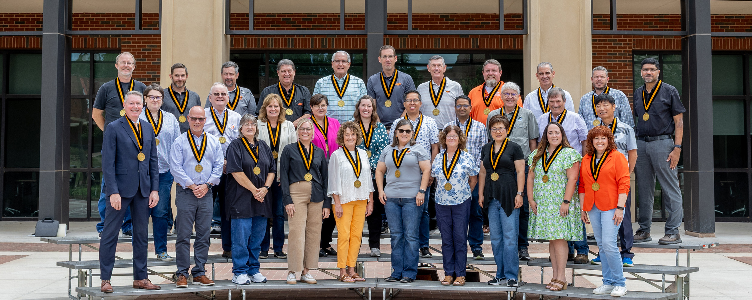 2025-ferguson-faculty-awards-2500x1000.jpg Faculty in the Ferguson College received commemorative medallions to recognize past awards.