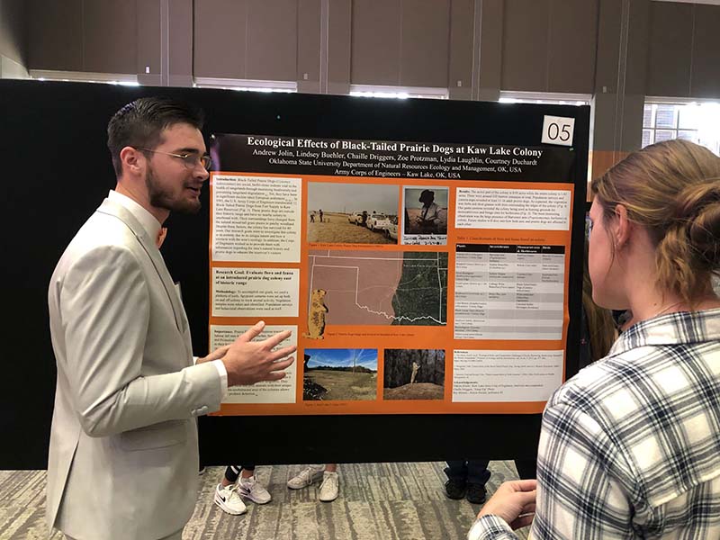 Andrew Jolin presenting his poster.