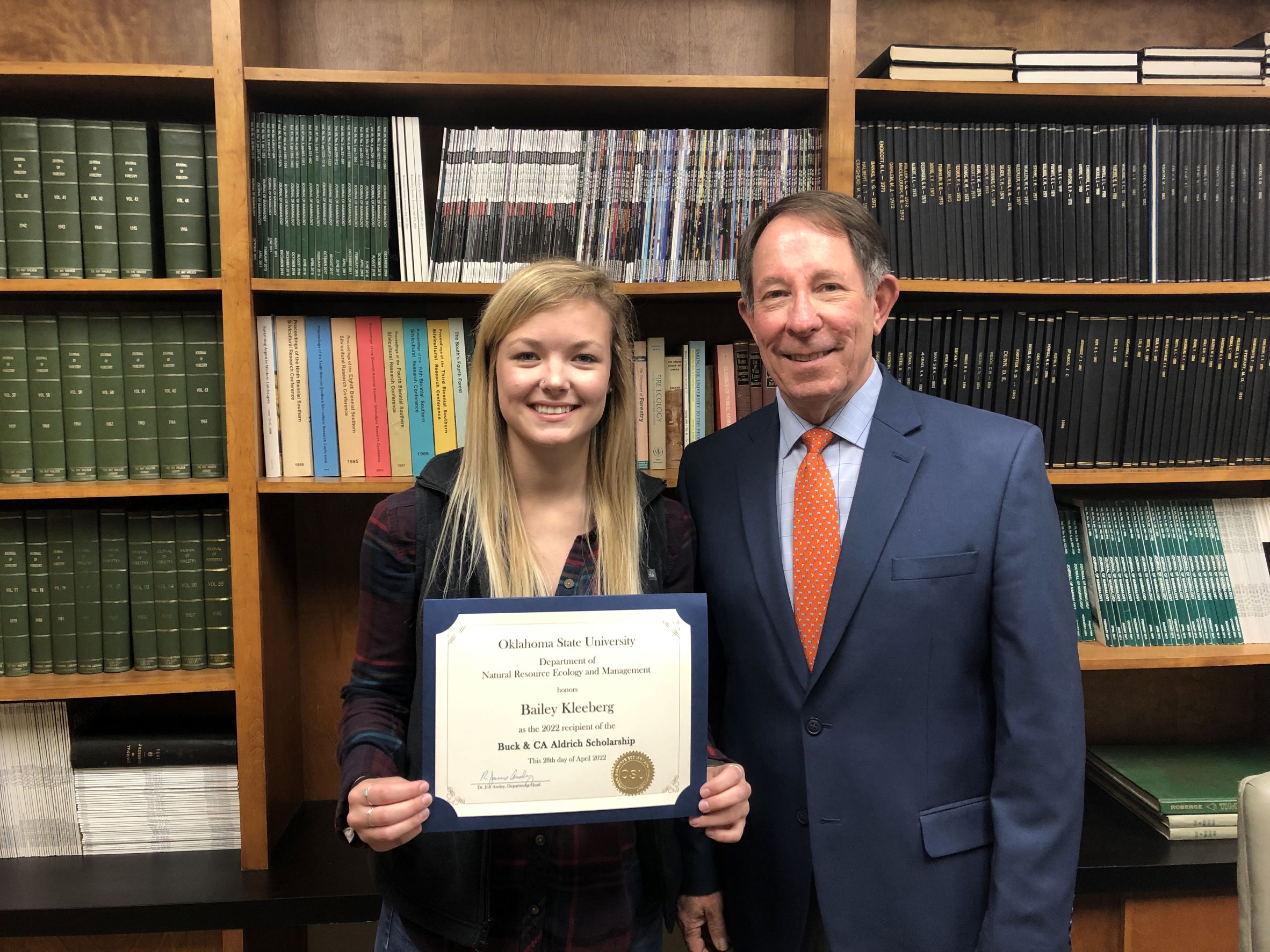 Bailey Kleeberg receiving a scholarship from Dr. Jim Ansley. Bailey Kleeberg receiving a scholarship from Dr. Jim Ansley.