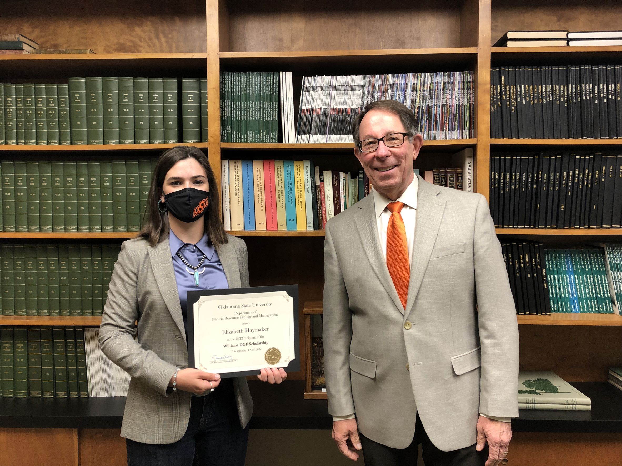 Elizabeth Haymaker receiving a scholarship from Dr. Jim Ansley. Elizabeth Haymaker receiving a scholarship from Dr. Jim Ansley.