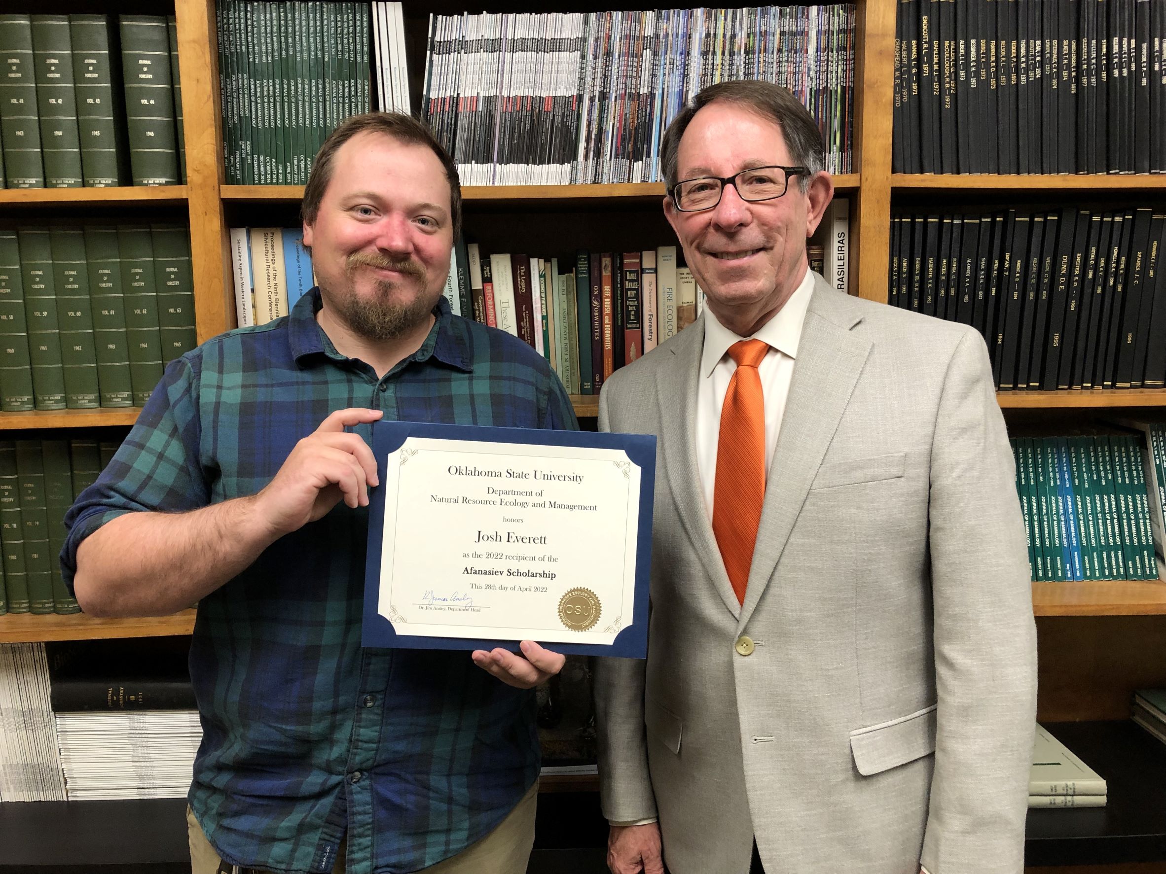 Josh Everett receving a scholarship from Dr. Jim Ansley. Josh Everett receving a scholarship from Dr. Jim Ansley.