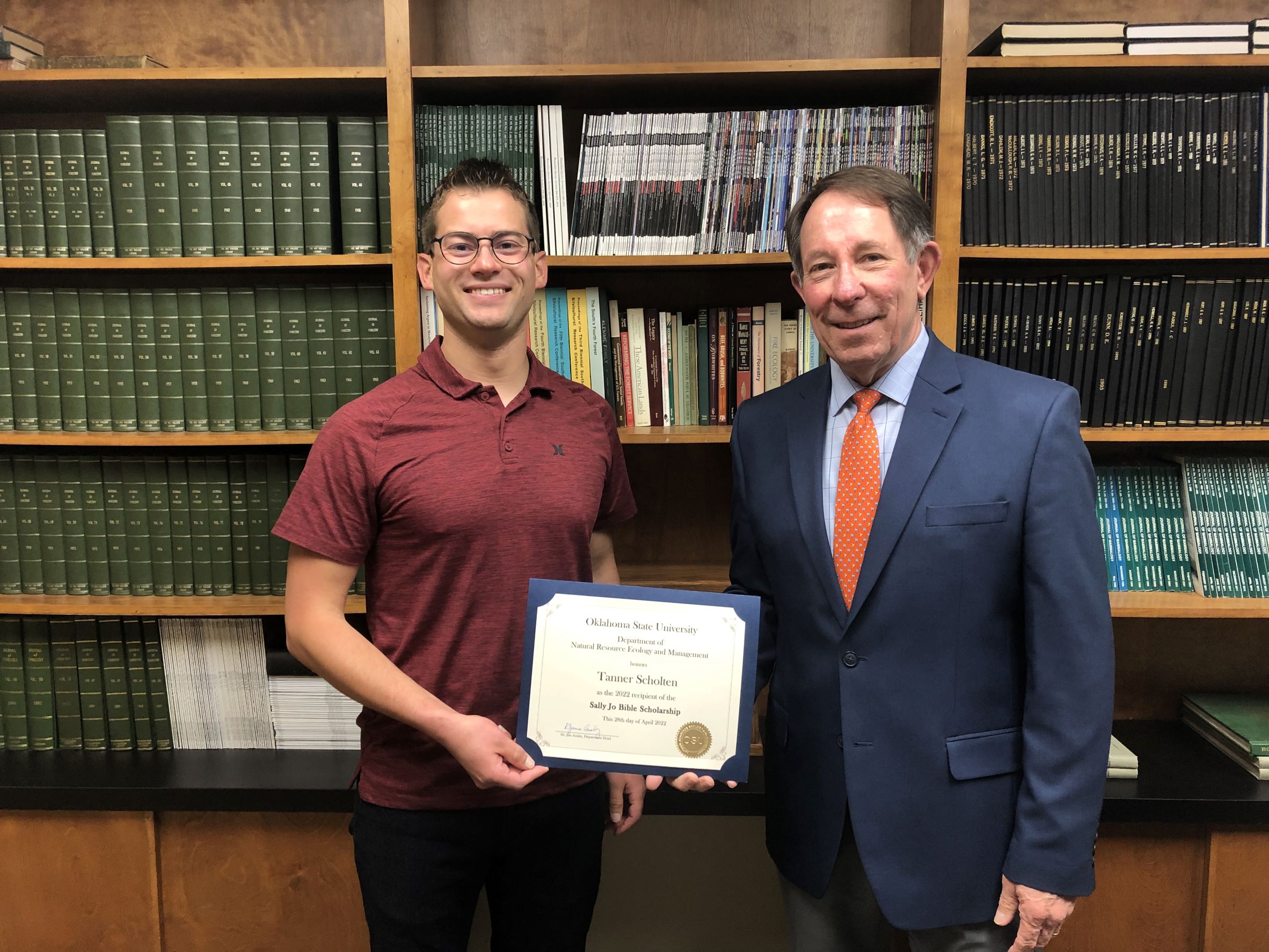 Tanner Scholton receiving a scholarship from Dr. Jim Ansley. Tanner Scholton receiving a scholarship from Dr. Jim Ansley.