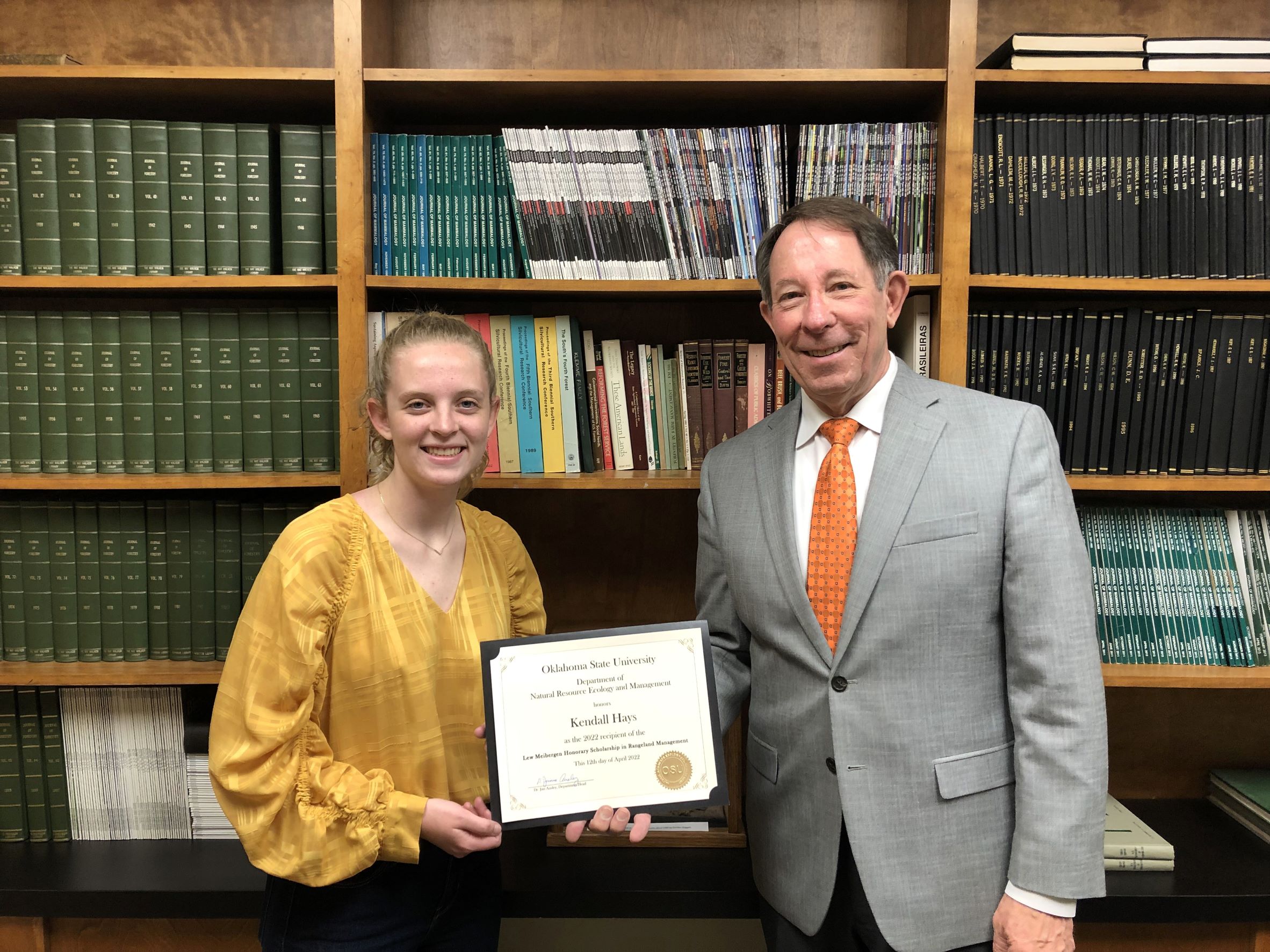 Kendall Hays receiving a scholarship from Dr. Jim Ansley. Kendall Hays receiving a scholarship from Dr. Jim Ansley.