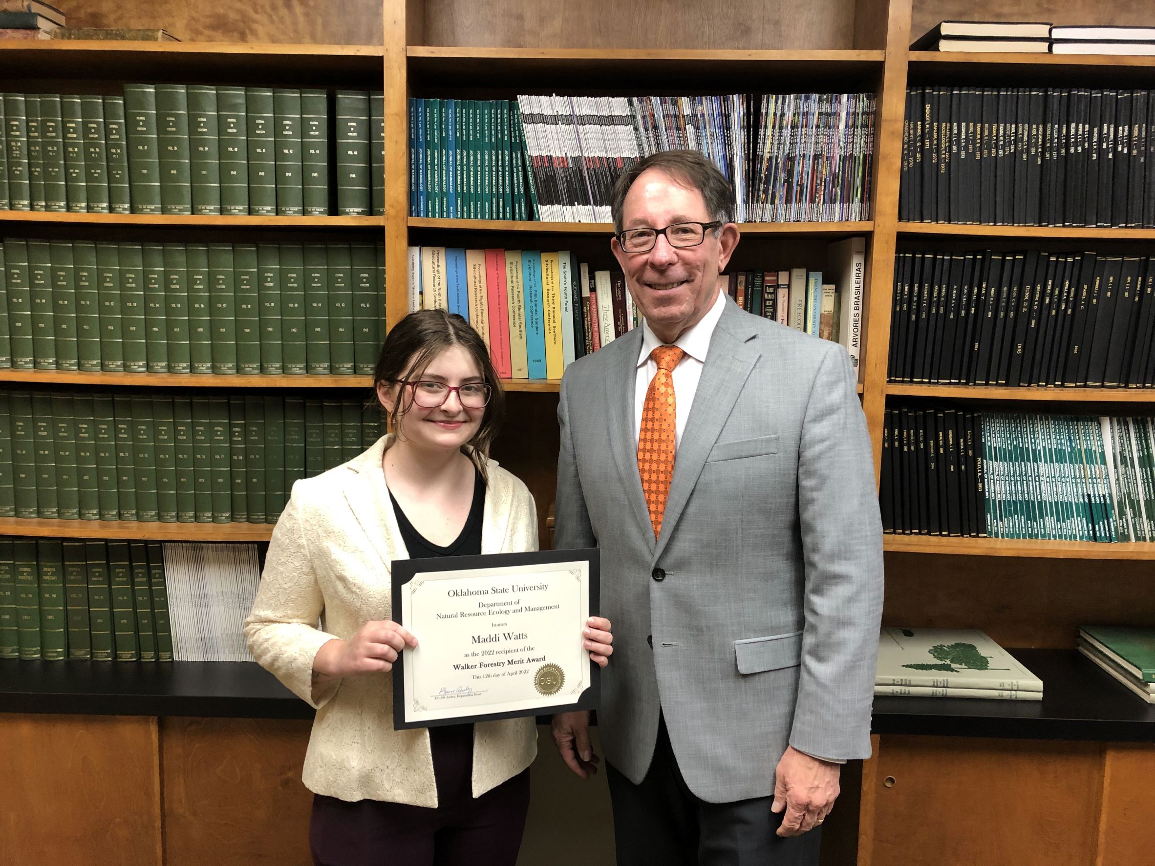 Maddi Watts receiving a scholarship from Dr. Jim Ansley. Maddi Watts receiving a scholarship from Dr. Jim Ansley.
