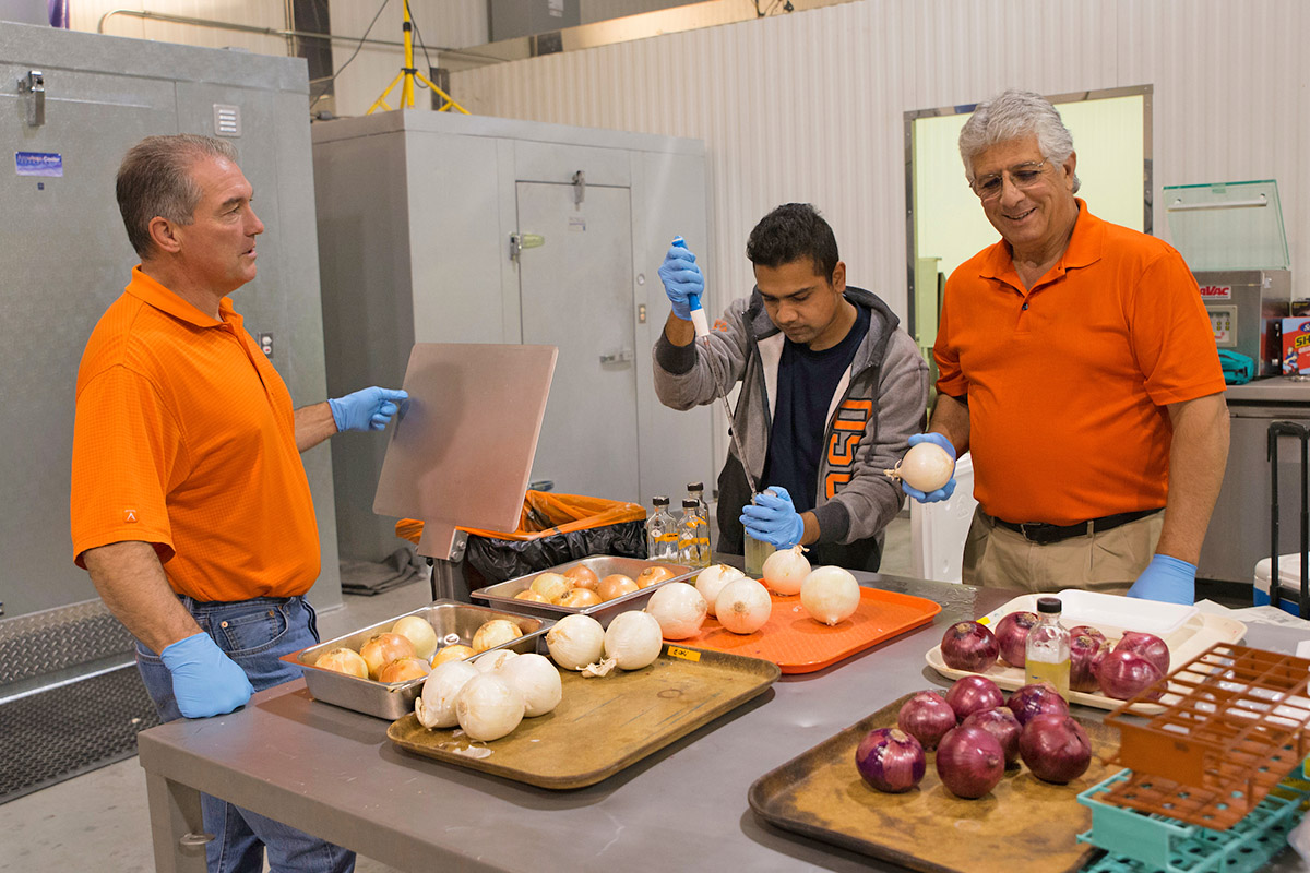 Food safety faculty and graduate student