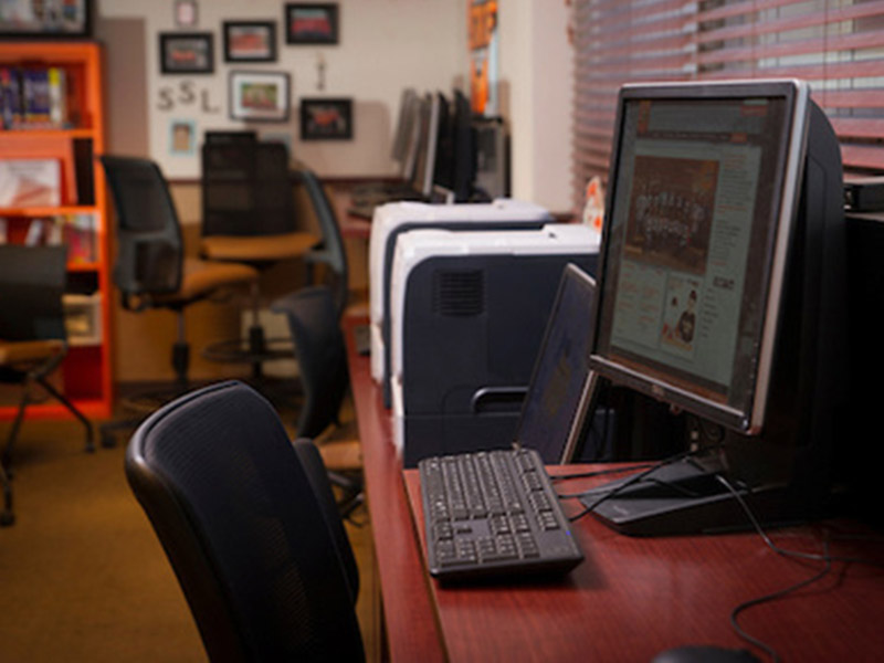 A computer and chair sitting in an OSU office. A computer and chair sitting in an OSU office.