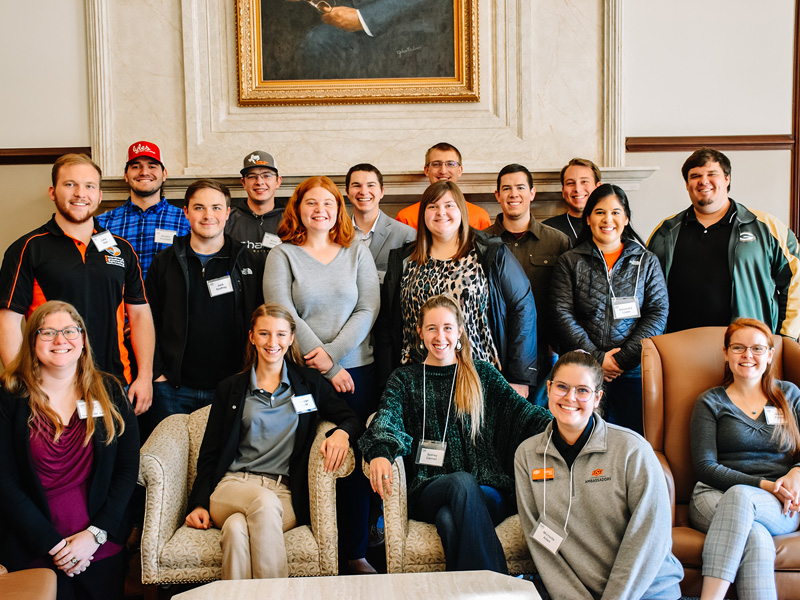A group of people smiling for the camera.