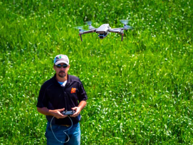 A ground operator running a drone. A ground operator running a drone.