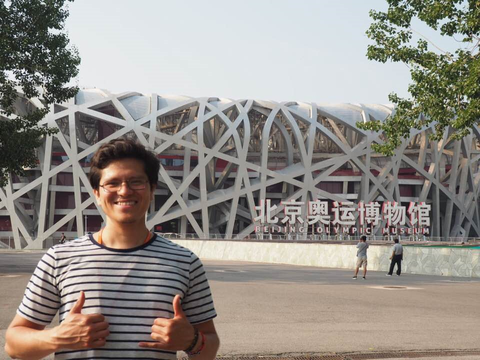 David Cautle Parra, an OSU student, standing in front of an Olympic complex in China.