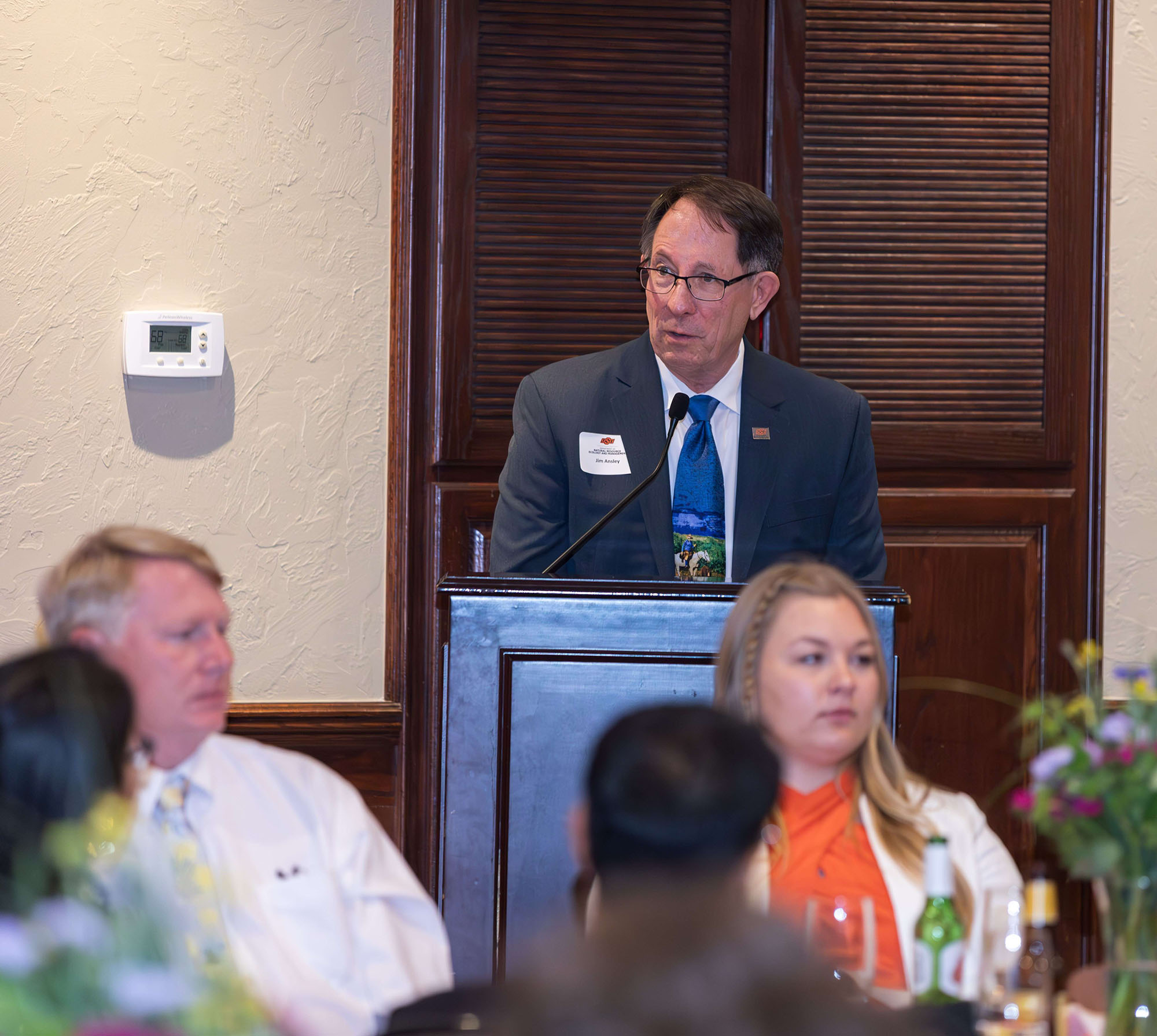 Jim Ansley speaking behind the podium.