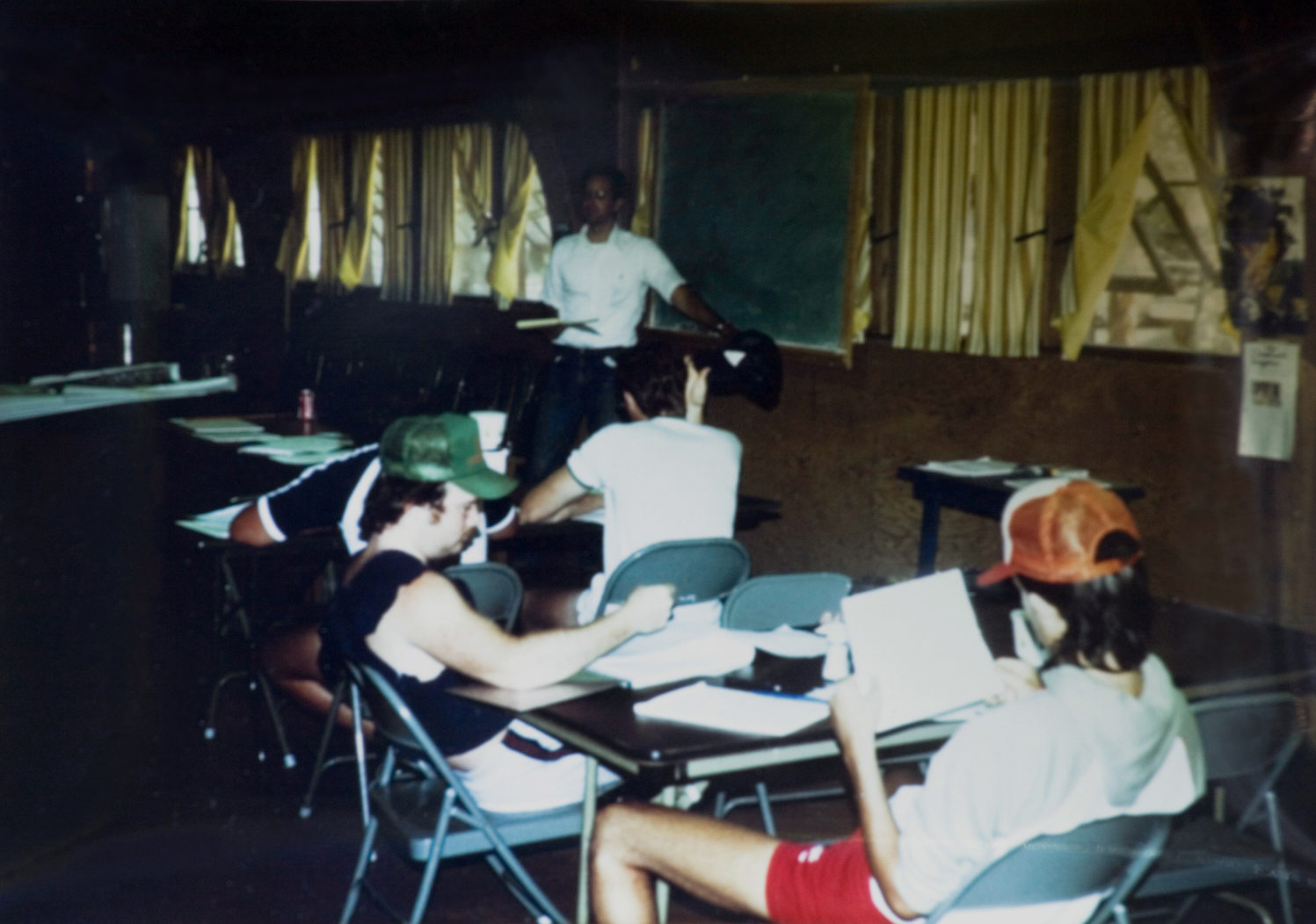 Students seated in the classroom listening to the instructor.