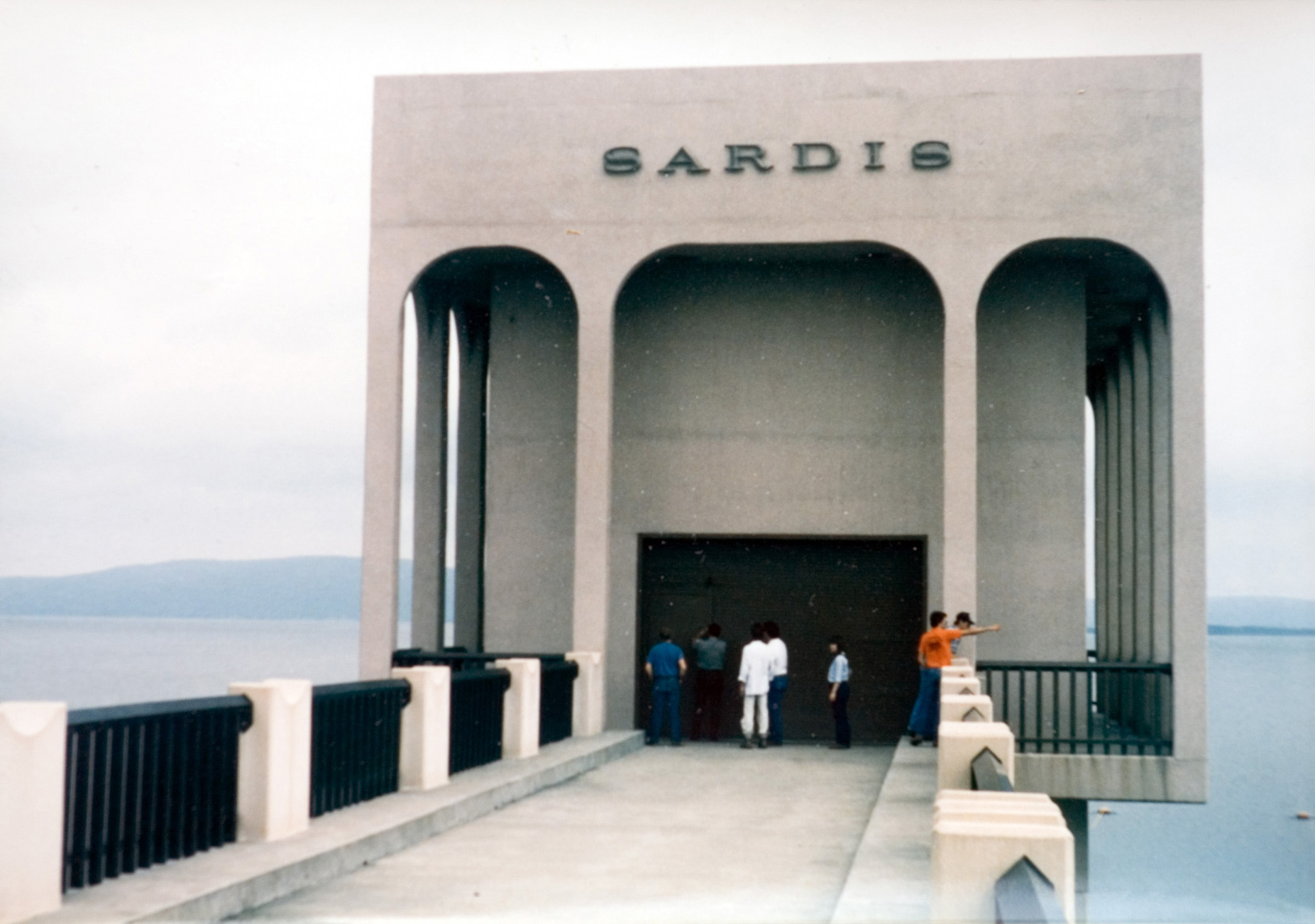 A group of students standing outside the Sardis Lake entrance.