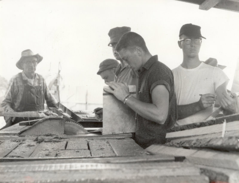 Students working on wood projects.