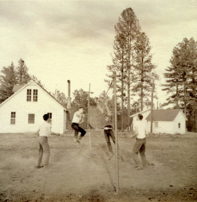Students playing voleyball outside. Students playing voleyball outside.