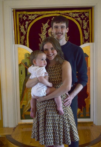 Jacob Seagraves is accepting his award from Jim Ansley in front of a book shelf Jacob Seagraves is accepting his award from Jim Ansley in front of a book shelf