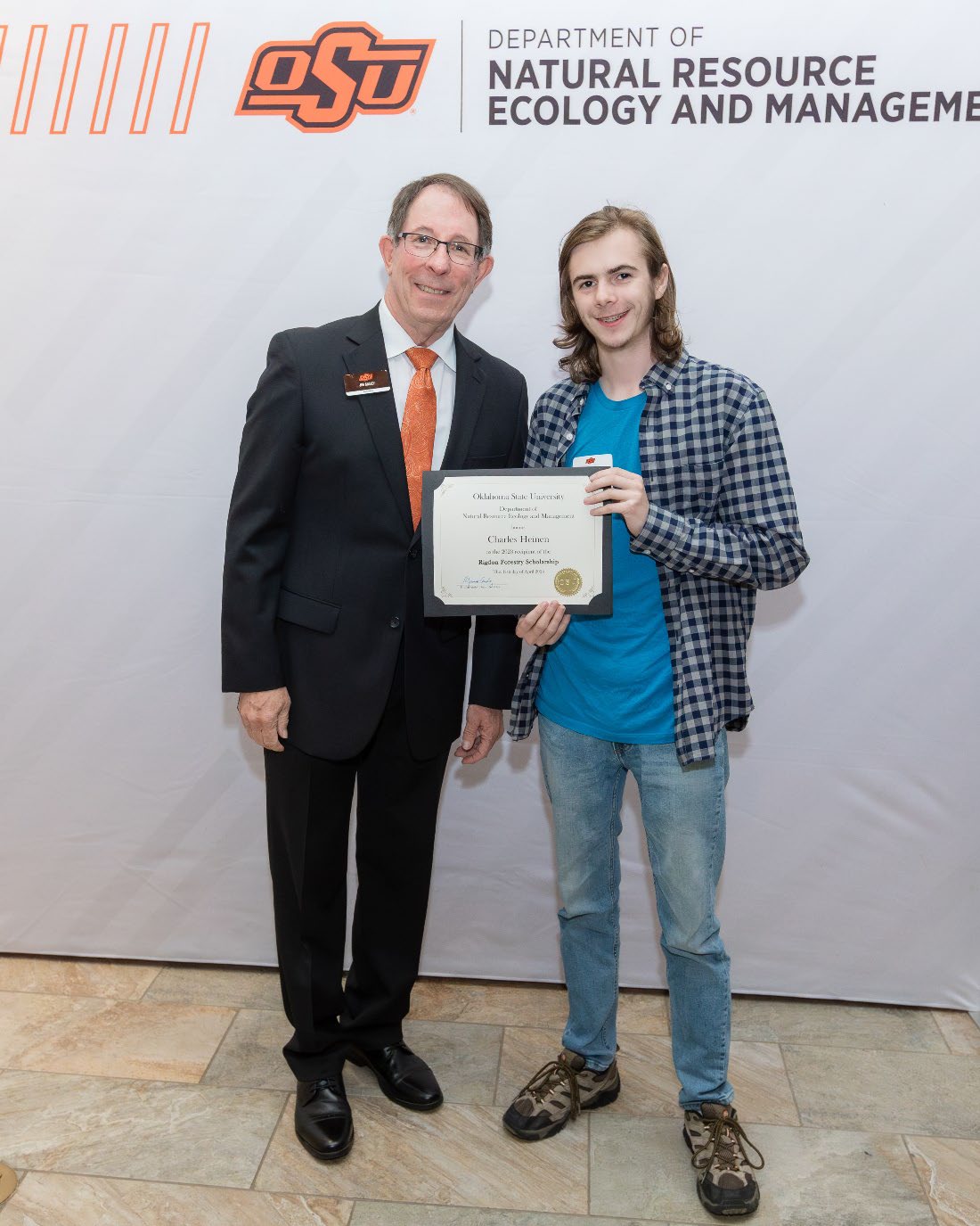 Charles Heinen with Jim Ansley accepting his Undergraduate Student Scholarship award.