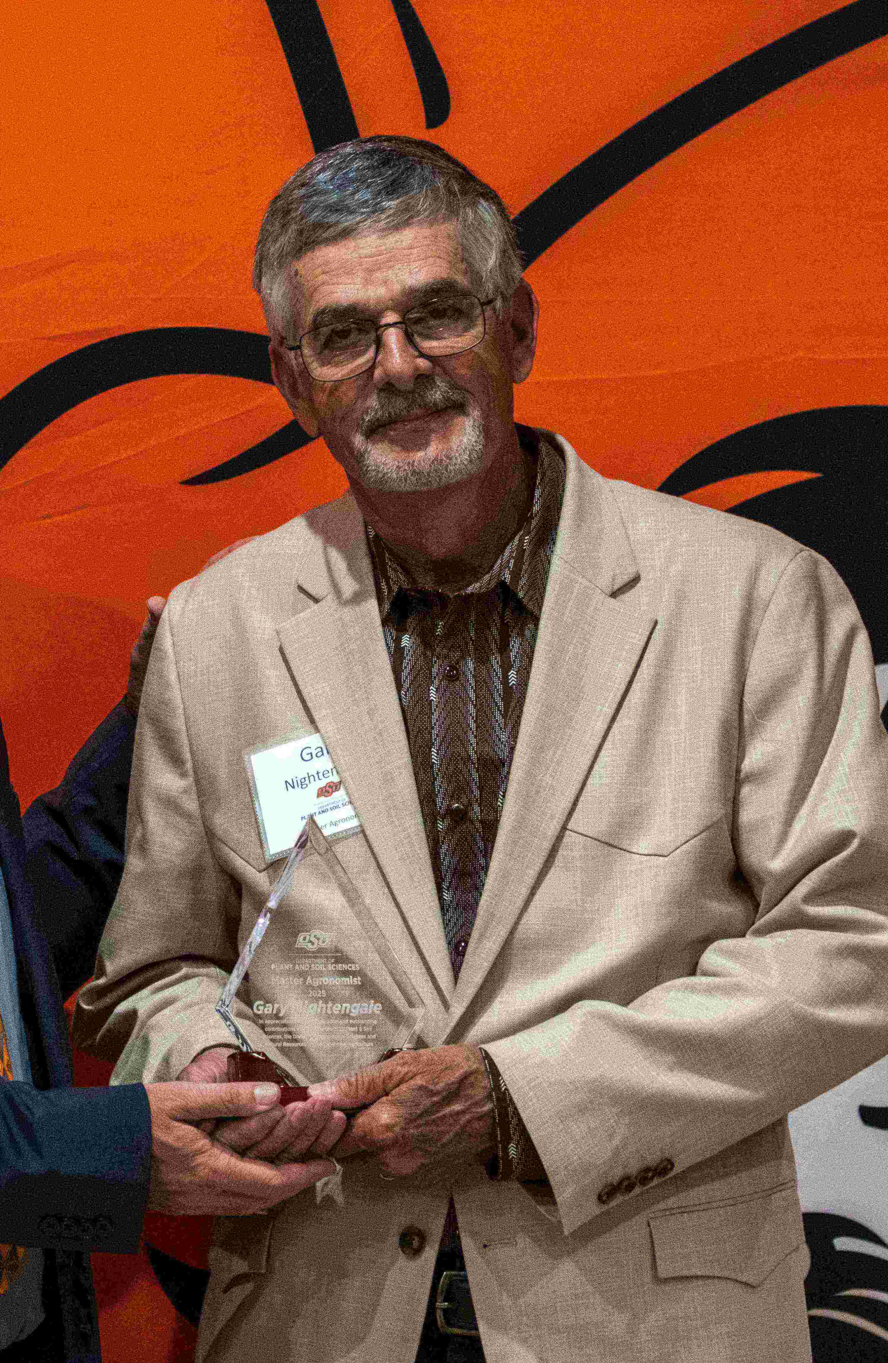 A professional photo of Gary Nightengale.