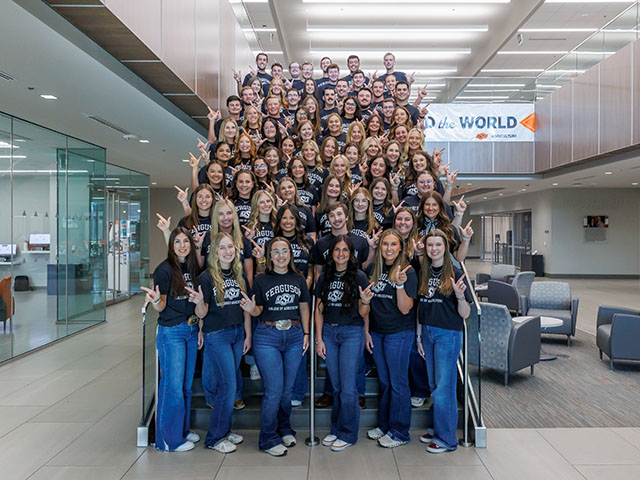 Student Success Leaders on the stairs of Agricultural Hall.